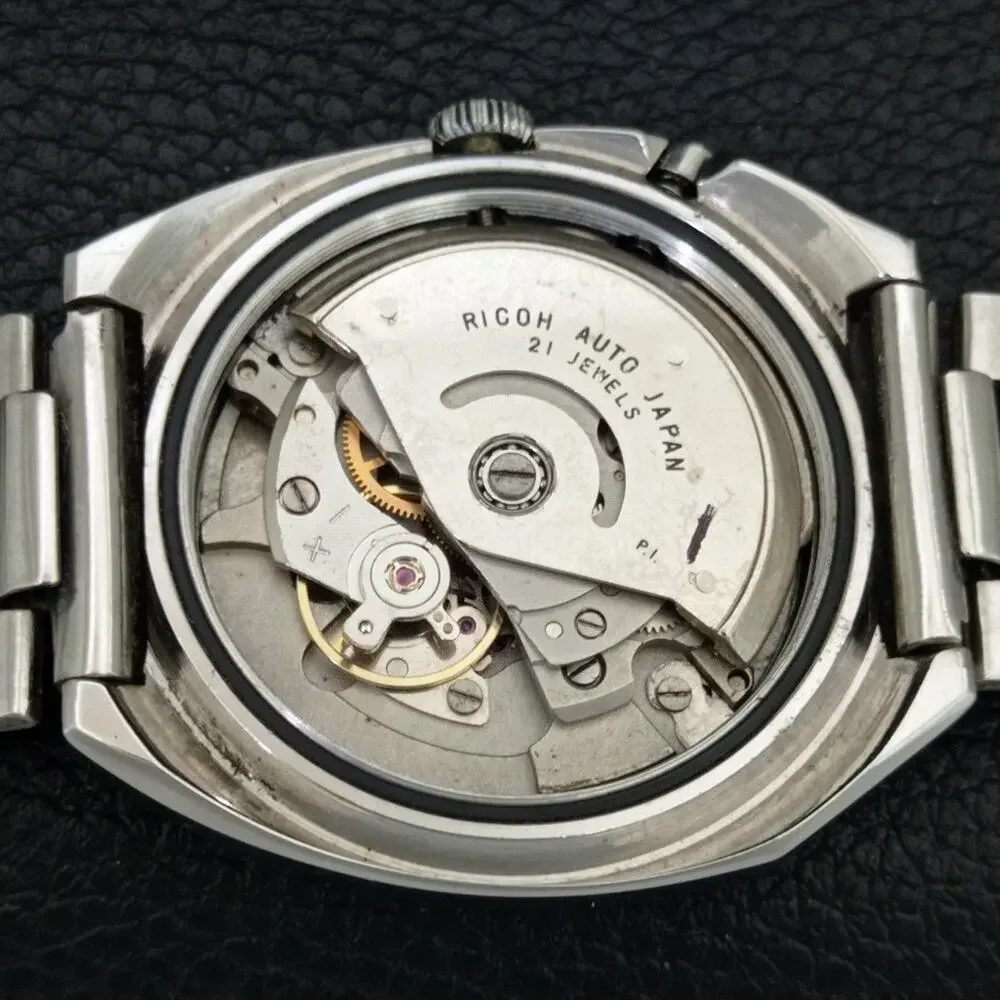 Vintage 1975 Ricoh Automatic Mens Silver Watch W/daydate & Blue accents